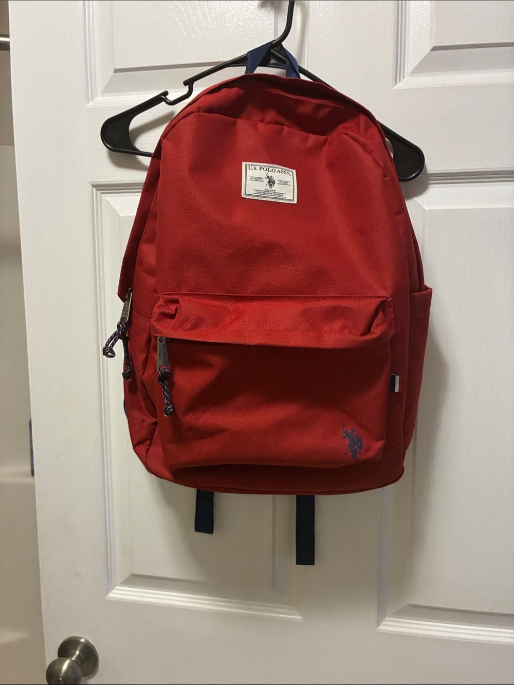 U.S. Polo Assn.Red Unisex 18”solid core backpack w/large main zipped compartment